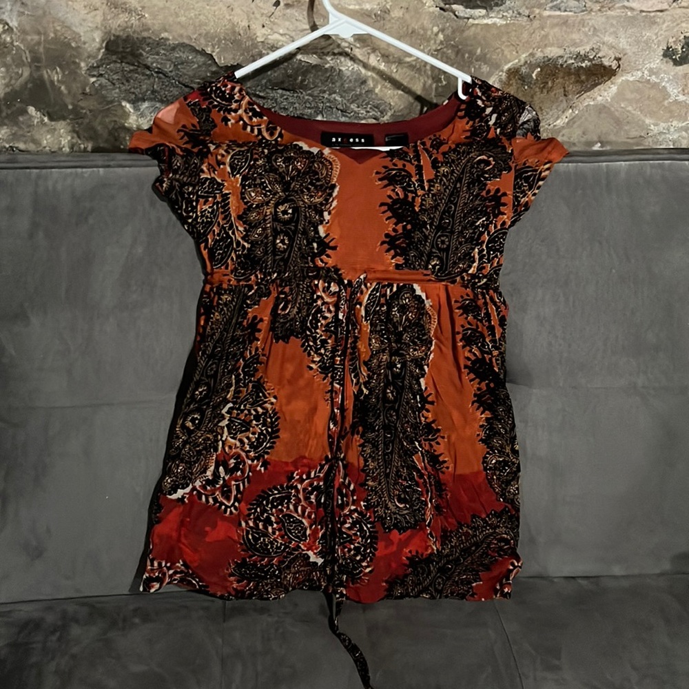 Orange patterned blouse